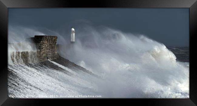 Porthcawl Lighthouse Amidst Winter's Fury. Framed Print by Philip Veale