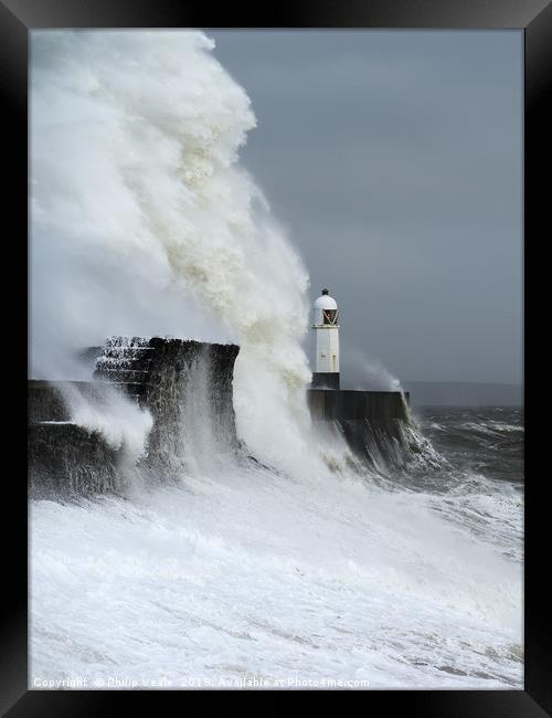 Porthcawl Lighthouse Battles Storm Freya. Framed Print by Philip Veale