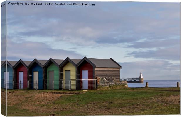 Colourful beach huts at Blyth, Northumberland. Canvas Print by Jim Jones