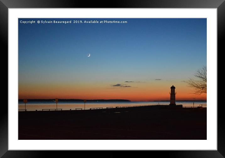 Lighthouse at sunset Framed Mounted Print by Sylvain Beauregard