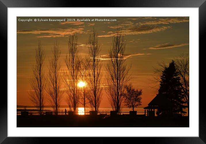 Sunset silhouettes Framed Mounted Print by Sylvain Beauregard