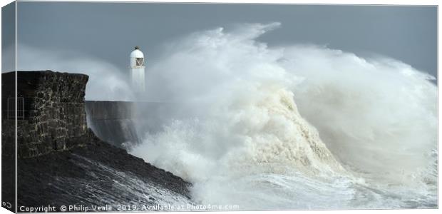 Porthcawl Lighthouse as Storm Freya crashes ashore Canvas Print by Philip Veale