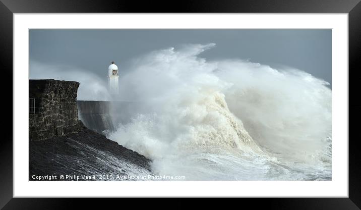 Porthcawl Lighthouse as Storm Freya crashes ashore Framed Mounted Print by Philip Veale