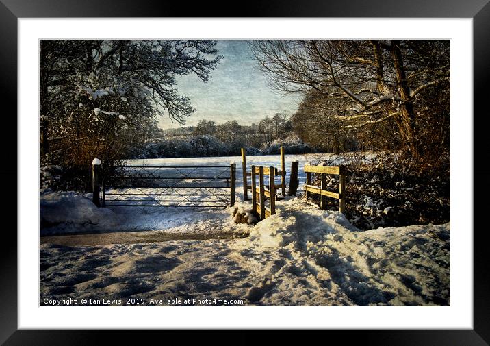 A Snowy Day In Tidmarsh Framed Mounted Print by Ian Lewis
