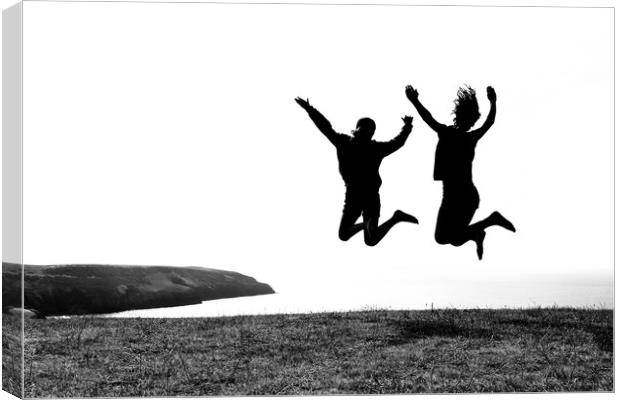 Jumping for Joy near Abersoch Canvas Print by Jonathan Tallon