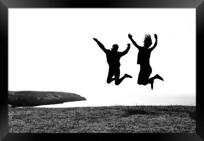 Jumping for Joy near Abersoch Framed Print by Jonathan Tallon