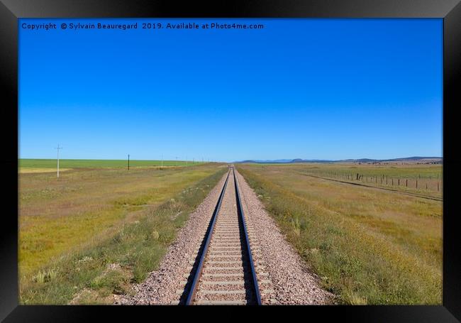 Railroad in the prairie, horizontal Framed Print by Sylvain Beauregard