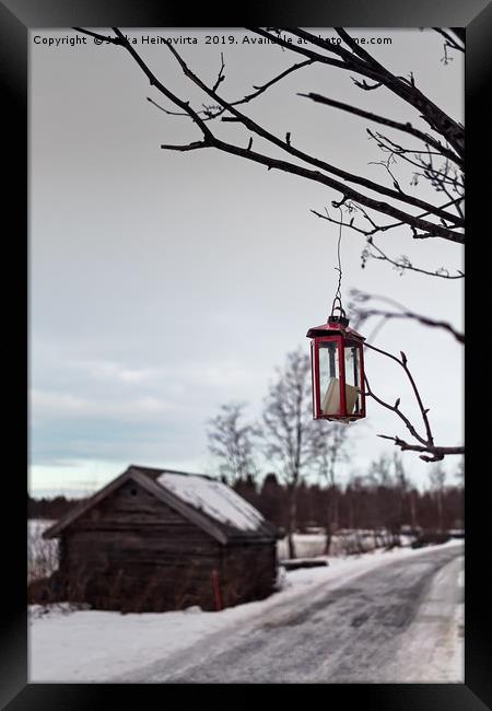 Candle In A Broken Lantern Framed Print by Jukka Heinovirta
