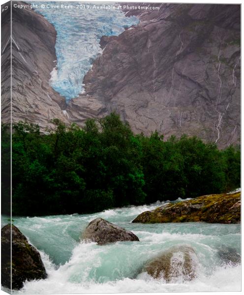 Blue ice water from  the Briksdal Glacier Norway Canvas Print by Clive Rees