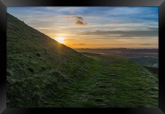 The sunset around the hill Framed Print by David Wilson