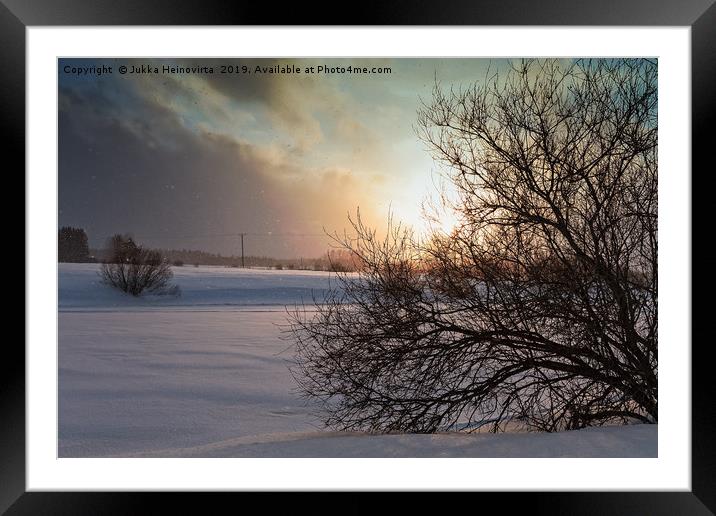 Sunset In The Snowfall Framed Mounted Print by Jukka Heinovirta
