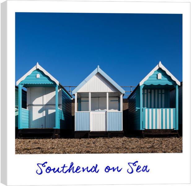 Southend Beach Hut Trio in Blue Canvas Print by Dave Denby
