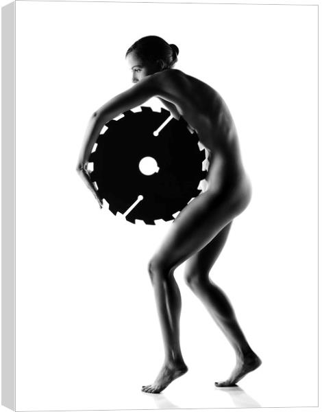 Nude woman with saw blade 1 Canvas Print by Johan Swanepoel