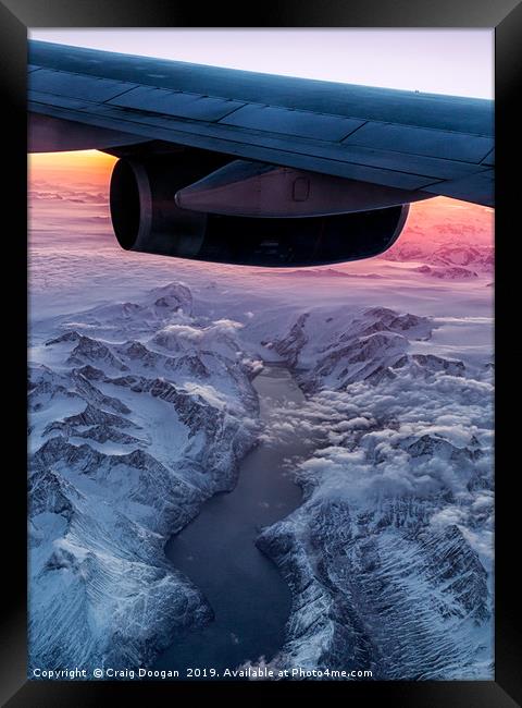 Flying over Greenland at 38000ft Framed Print by Craig Doogan