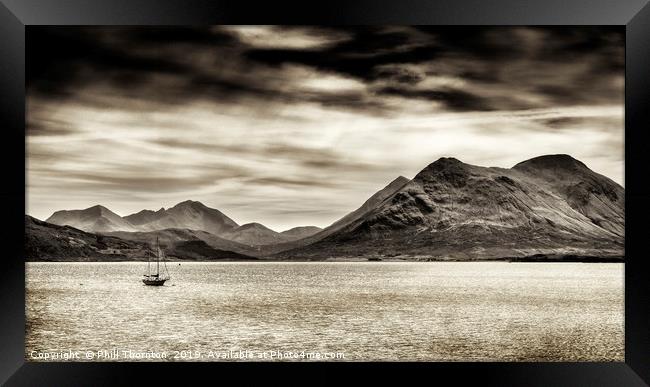 Stormy skies over the The Sound of Raasay Framed Print by Phill Thornton