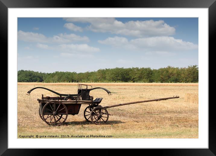 old fire wagon on field Framed Mounted Print by goce risteski