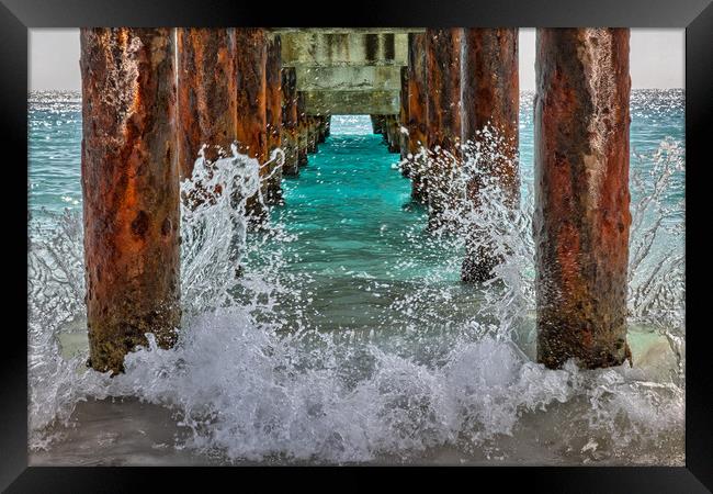 Under The Pier Framed Print by Roger Green