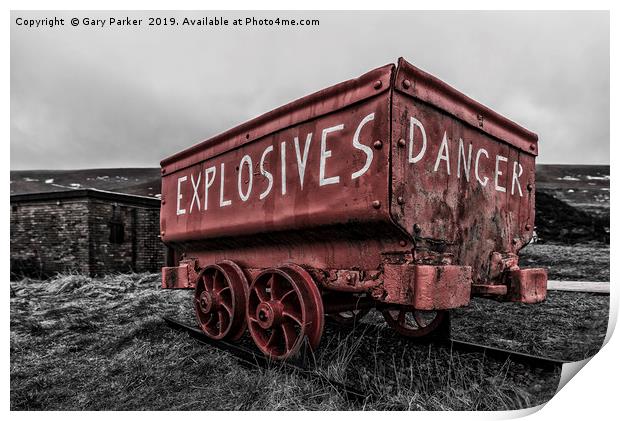 A bright red, weathered, mine cart Print by Gary Parker