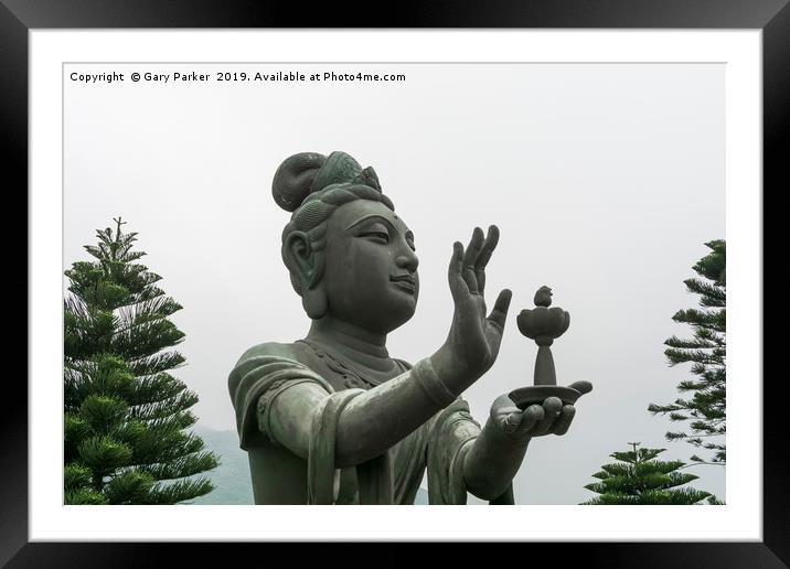 Buddhistic statue making offerings to Buddha Framed Mounted Print by Gary Parker