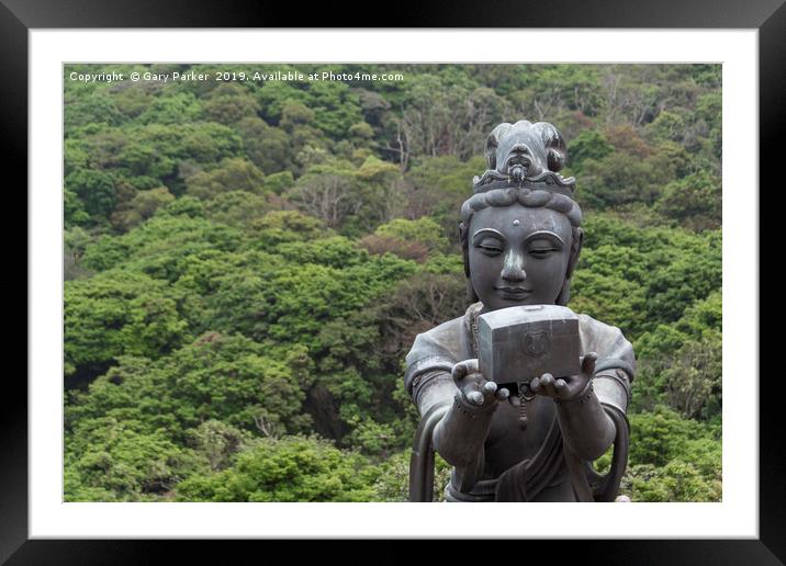 Buddhistic statue making offerings to the Buddha Framed Mounted Print by Gary Parker