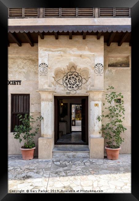 Ornate, Arabian doorway, with intricate carvings Framed Print by Gary Parker