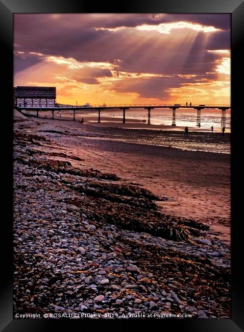 "Crepuscular Rays at Saltburn" Framed Print by ROS RIDLEY