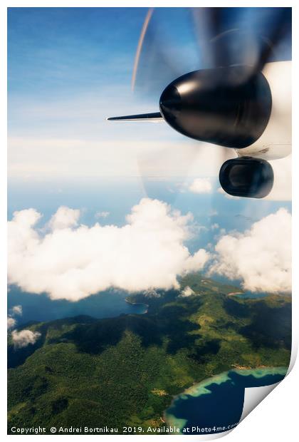 Propeller aircraft wing over tropical island Print by Andrei Bortnikau
