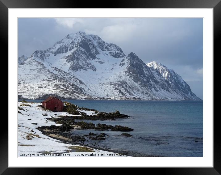 Fisherman's cabin in the snow on the fjord Lofoten Framed Mounted Print by yvonne & paul carroll