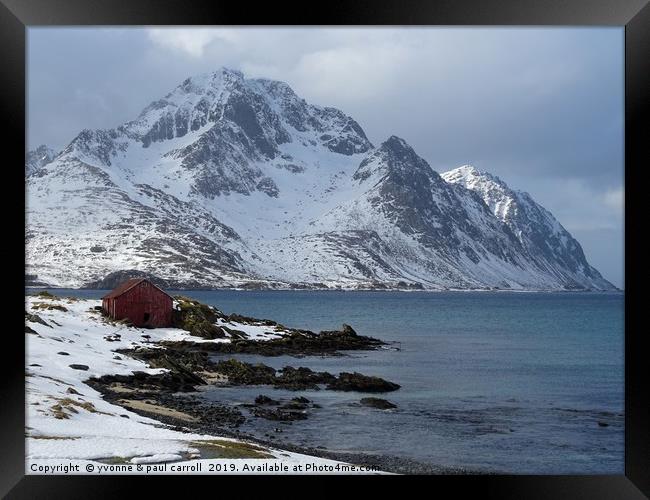 Fisherman's cabin in the snow on the fjord Lofoten Framed Print by yvonne & paul carroll