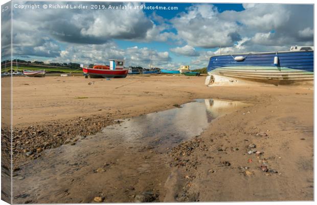 Boats Moored in Alnmouth Harbour at Low Tide Canvas Print by Richard Laidler