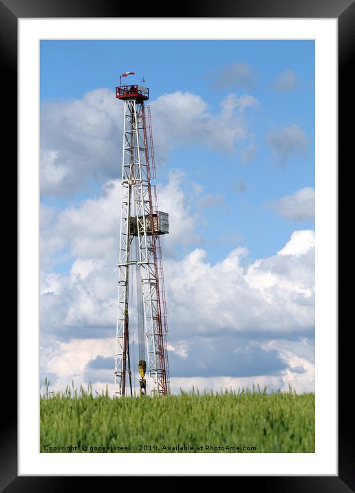 oil drilling rig and blue sky Framed Mounted Print by goce risteski