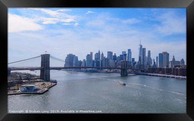 Manhattan Skyline from Manhattan Bridge  Framed Print by Graham Long