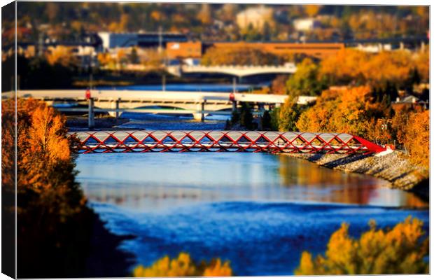 The Red Bridge over the bow River  Canvas Print by Osarieme Eweka