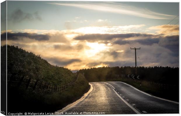 Scottish landscape, the road at the sunset Canvas Print by Malgorzata Larys
