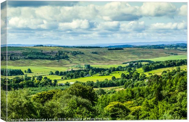 Beautiful hills and fields of Scotland Canvas Print by Malgorzata Larys