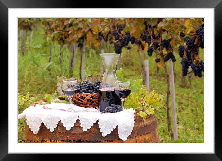 red wine and grape on wooden barrel Framed Mounted Print by goce risteski