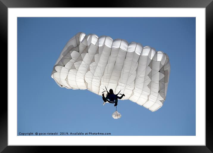 parachutist on blue sky extreme sport  Framed Mounted Print by goce risteski