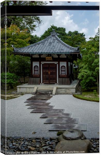 A traditional building in a Japanese Zen Garden.  Canvas Print by Gary Parker