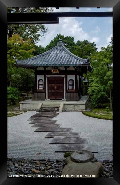 A traditional building in a Japanese Zen Garden.  Framed Print by Gary Parker