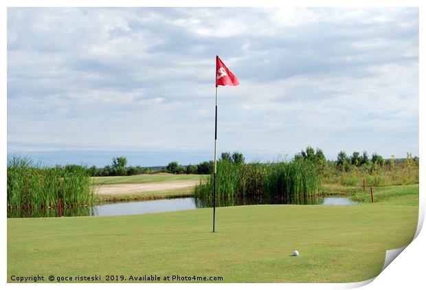 golf course with red flag and ball Print by goce risteski