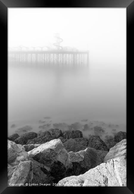 A view from the rocks Framed Print by Wayne Lytton