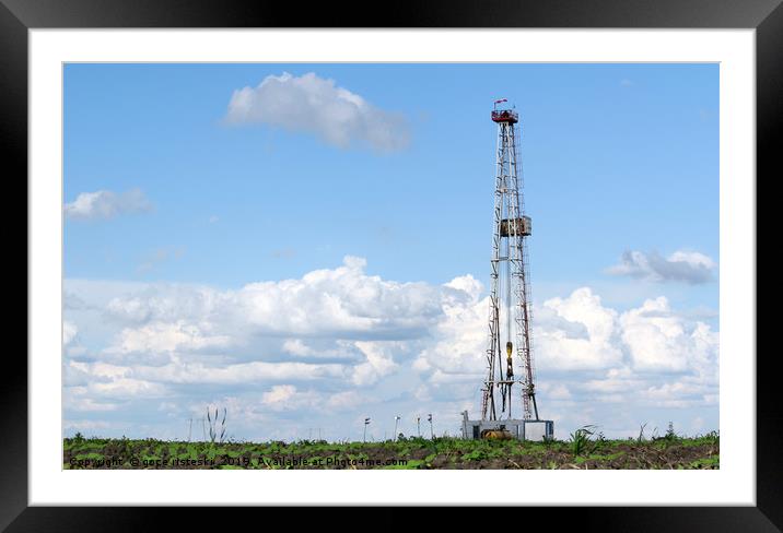 land oil drilling rig on field landscape Framed Mounted Print by goce risteski