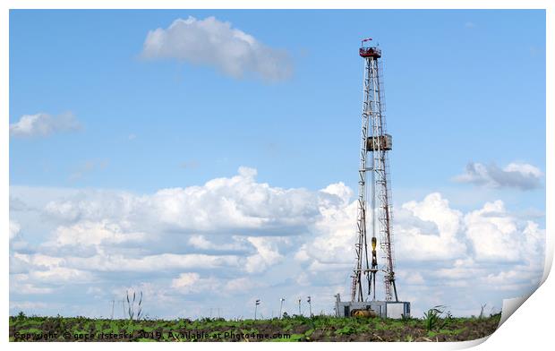 land oil drilling rig on field landscape Print by goce risteski