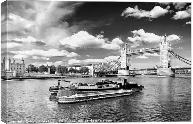 Tower Bridge and the boats in London in black and  Canvas Print by Malgorzata Larys