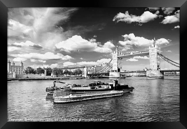 Tower Bridge and the boats in London in black and  Framed Print by Malgorzata Larys