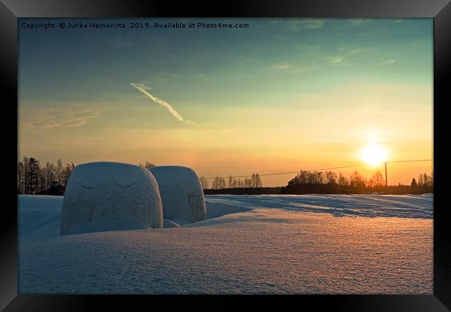Two Bales In The Winter Sunset Framed Print by Jukka Heinovirta