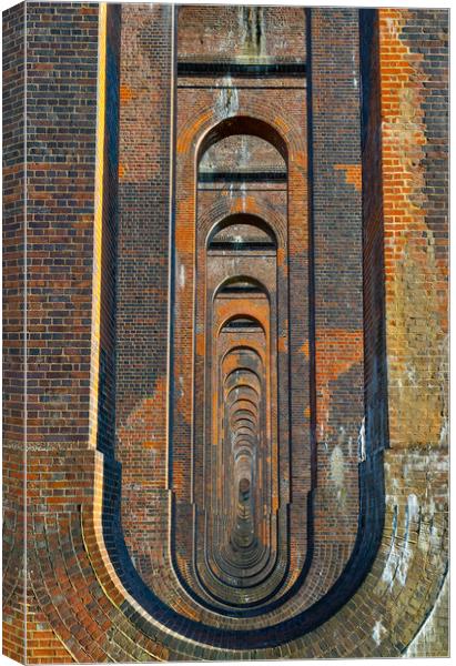 Underneath The Arches Canvas Print by Nick Hunt