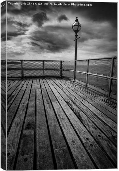 Sitting on the end of the Pier Canvas Print by Chris Good