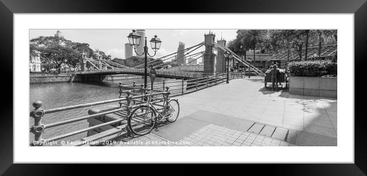 Bicycle leaning against railings with Cavenagh Bri Framed Mounted Print by Kevin Hellon