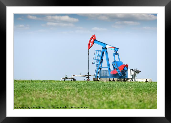 oil pump jack on oilfield Framed Mounted Print by goce risteski